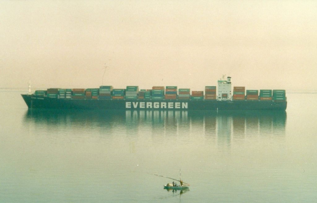 A large container ship loaded with containers transiting the Suez Canal