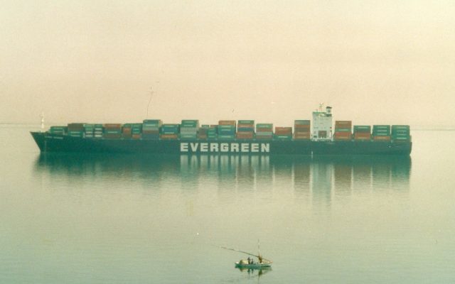 A large container ship loaded with containers transiting the Suez Canal