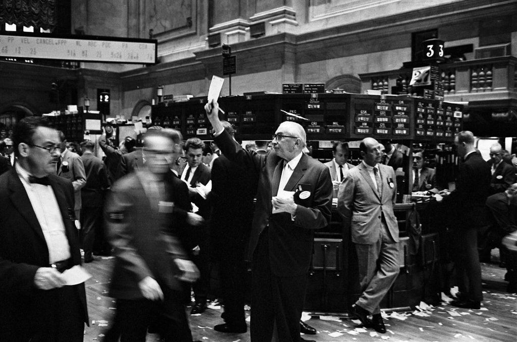 Traders crowded on the floor of the New York Stock Exchange