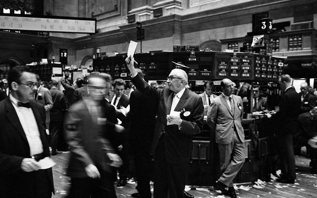 Traders crowded on the floor of the New York Stock Exchange